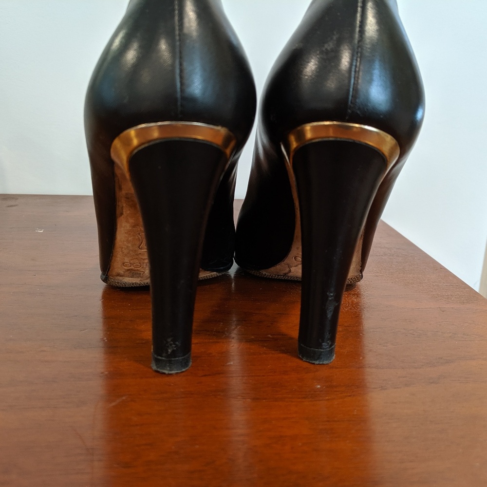 Jimmy Choo black and gold heels